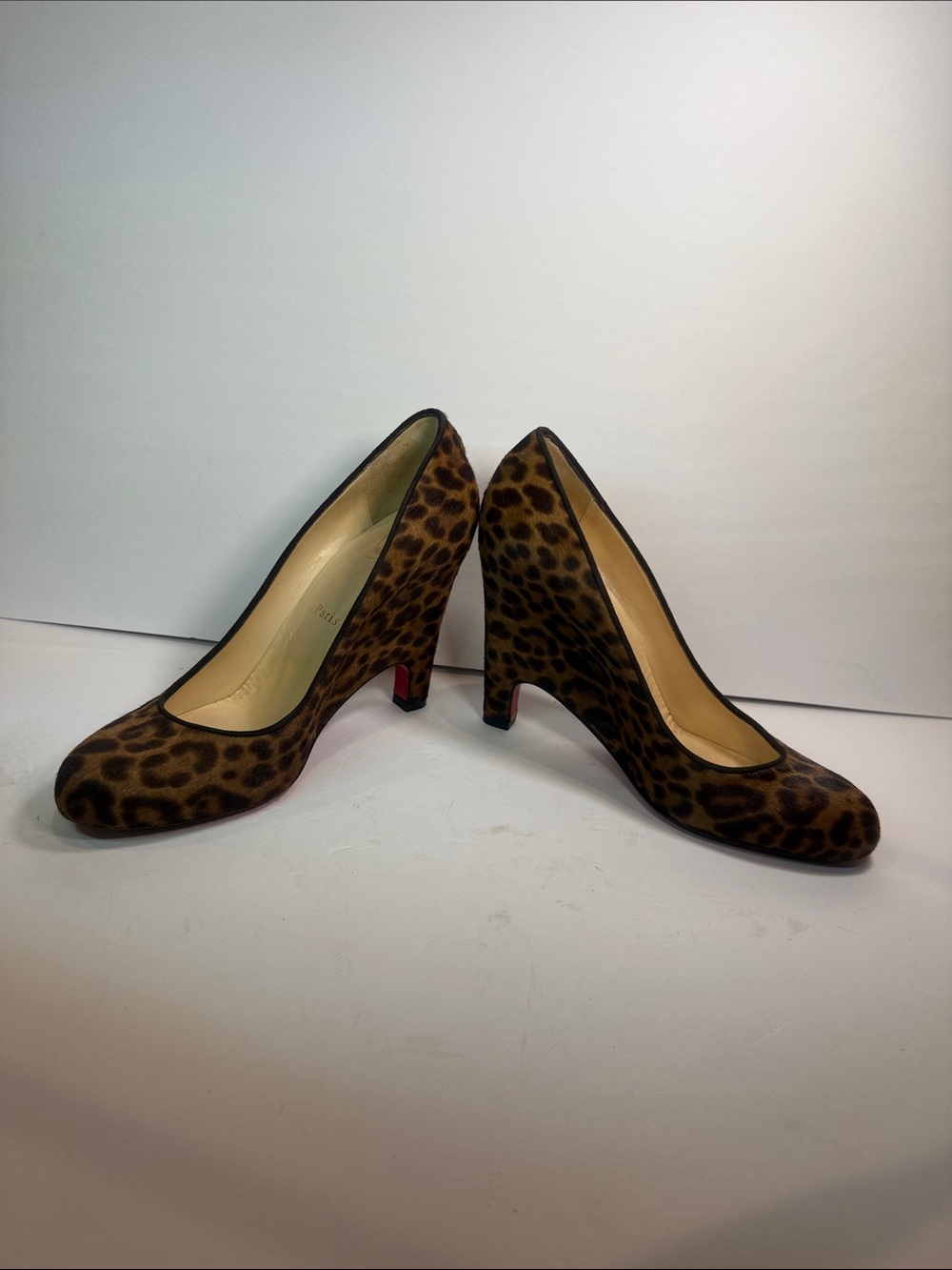 Christian Louboutin Leopard Print Calf Hair Pumps with Signature Red Soles